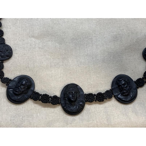 428 - 19th cent. Grand Tour cameo bracelet, black lava carved classical busts, three large 1½ins. x 1ins, ... 