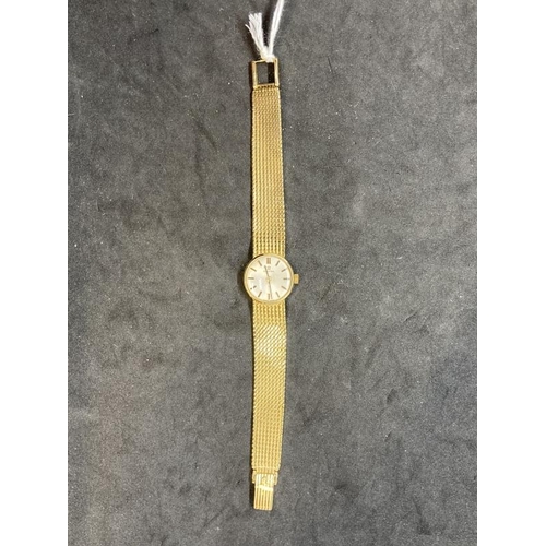 438 - Watches: Ladies 18ct gold Omega bracelet watch, round silver coloured dial. Total weight 36.7g.