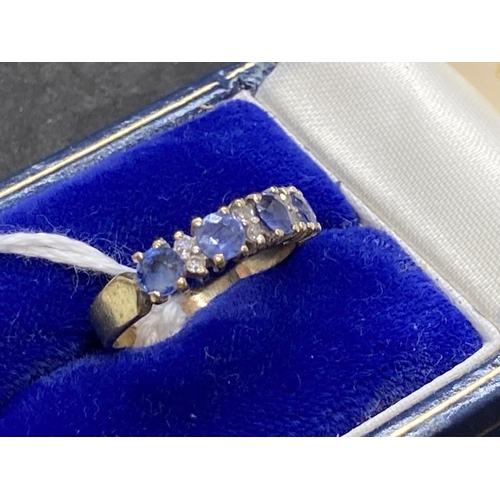 441 - Hallmarked Jewellery: 9ct gold ring half hoop set with four circular cut sapphires, estimated weight... 