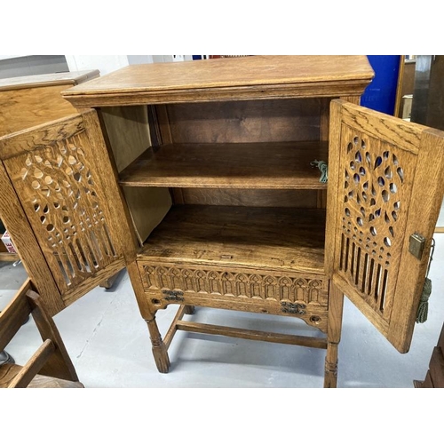 45 - 20th cent. Gothic style oak larder cupboard with two pierced and carved doors above a single fall, w... 