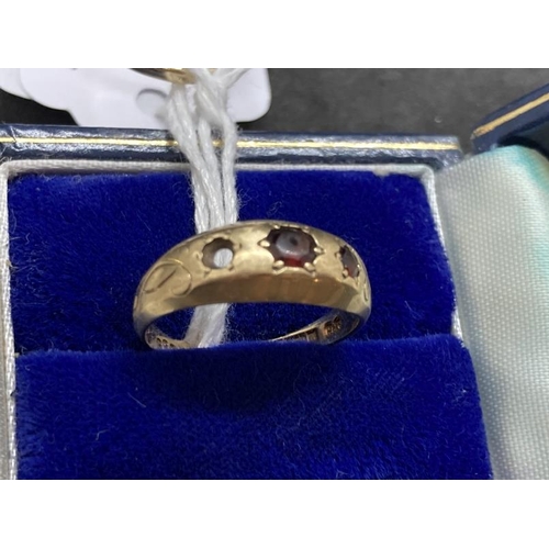 453 - Hallmarked Jewellery: Two 9ct gold rings, one set with yellow quartz and one set with two garnets (s... 