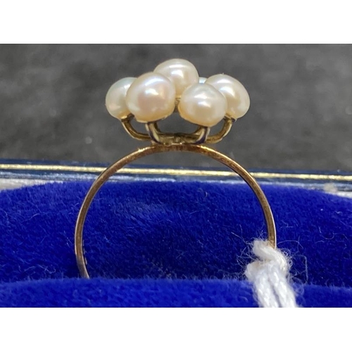 461 - Jewellery: Yellow metal ring in the form of a floral cluster of seven 4mm-3.5mm cultured pearls, tes... 