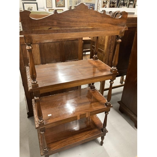 47 - Mahogany four tier whatnot with carved gallery, each shelf with carved moulded edge and pierced carv... 