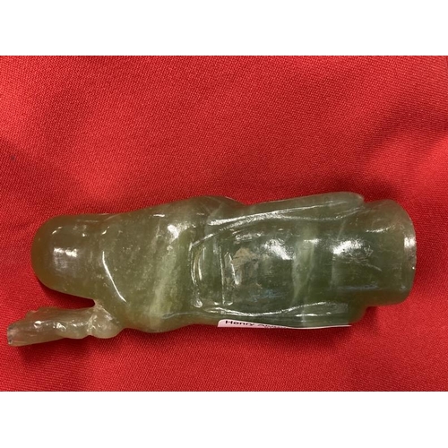 499 - 20th cent. Chinese green jadeite carved Immortal figurine, height 4¼ins.