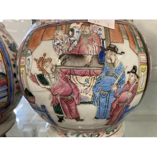 511 - 19th cent. Cantonese Famille Rose bulbous vase with narrow neck, two panels with figures, floriate d... 