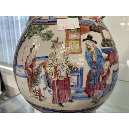 511 - 19th cent. Cantonese Famille Rose bulbous vase with narrow neck, two panels with figures, floriate d... 