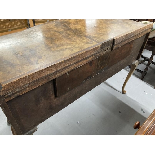 64 - 1920s bow front writing desk on cabriole supports with acanthus decoration to the knee. 44ins. x 19½... 