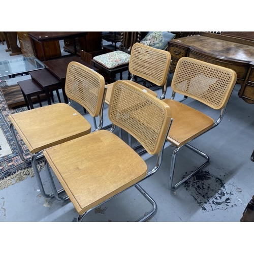 65 - Retro Design: After Marcel Breur/Cesca style chairs with plywood seats and cane backs and tubular me... 