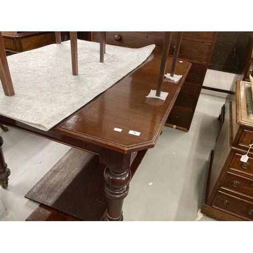 70 - 19th cent. Mahogany extending dining table on turned supports with castors, two inserts. Closed 48in... 