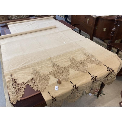 71 - Early 20th cent. Embossed linen blinds with lace borders, a pair. Total drop 88ins. x 40ins.