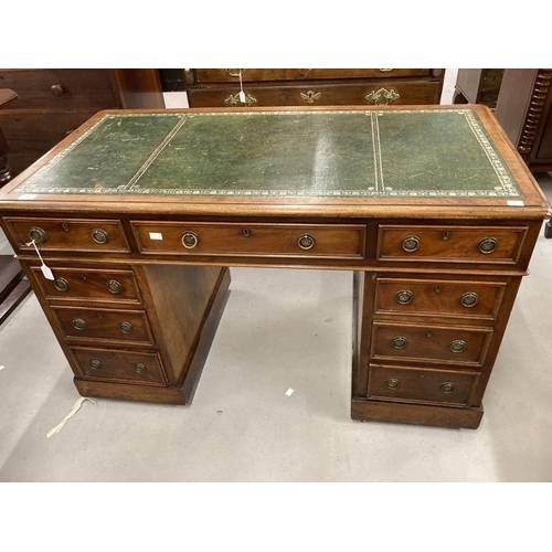 77 - 19th cent. Mahogany pedestal desk the rectangular top with green and gold tooled leather surface abo... 