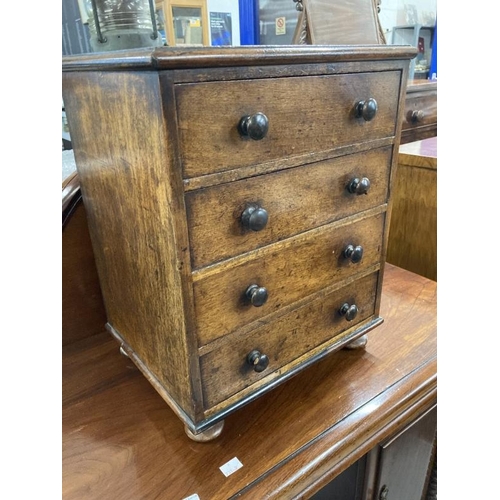 84 - 19th cent. Apprentice mahogany dwarf chest of four drawers. 15ins. x 19ins. x 12ins.