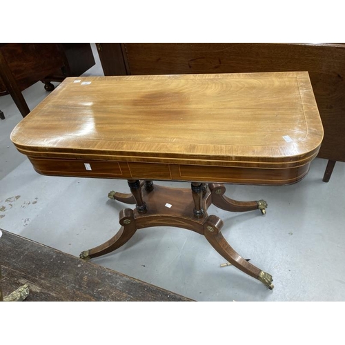 92 - 19th cent. Mahogany card table with boxwood inlay on four pillared supports with four splayed feet t... 