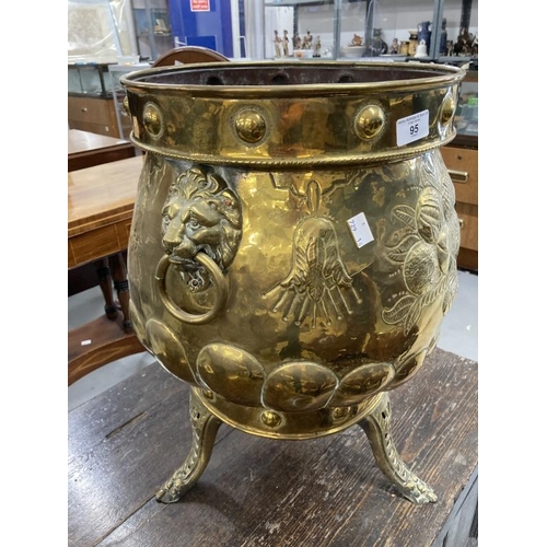 95 - Brassware: Early 20th cent. Brass coal bucket with lion mask handles embossed with a basket of fruit... 