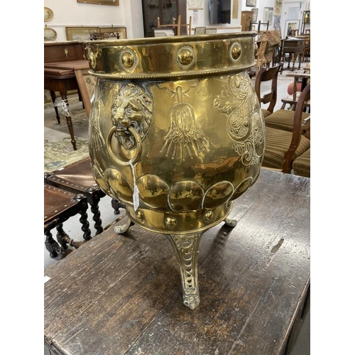 95 - Brassware: Early 20th cent. Brass coal bucket with lion mask handles embossed with a basket of fruit... 