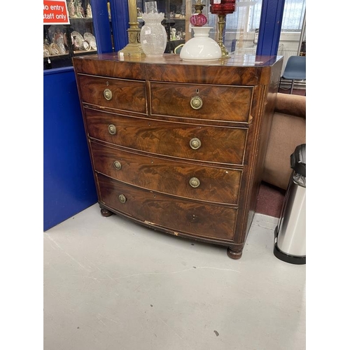 1 - Early 19th cent. Mahogany bow front chest of two over three drawers with a cross banded top, round b... 