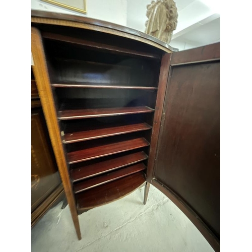 105 - Edwardian Regency revival mahogany corner cupboard with arched top glazed doors above a cupboard doo... 