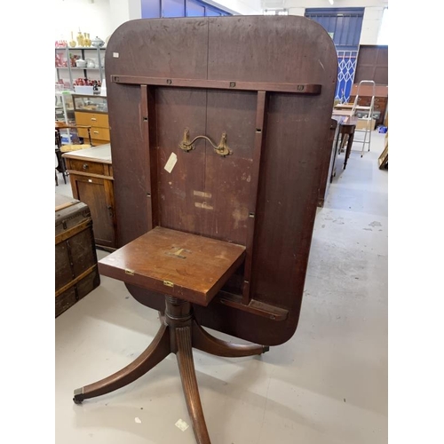 107 - Early 19th cent. Mahogany tilt top breakfast table, rounded corners to the rectangular top with reed... 