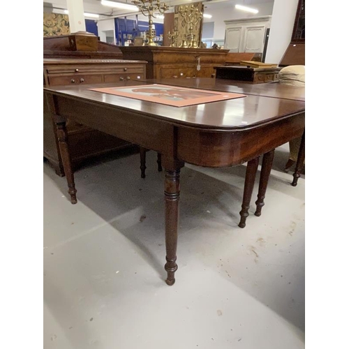 116 - Regency mahogany D shaped dining tables on ring turned tapering legs, a pair. 29½ins. x 57ins. x 54i... 