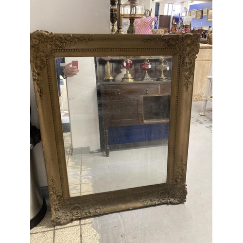 16 - Late 19th cent. Gilt framed mirror, with repairs. 45ins. x 36ins.