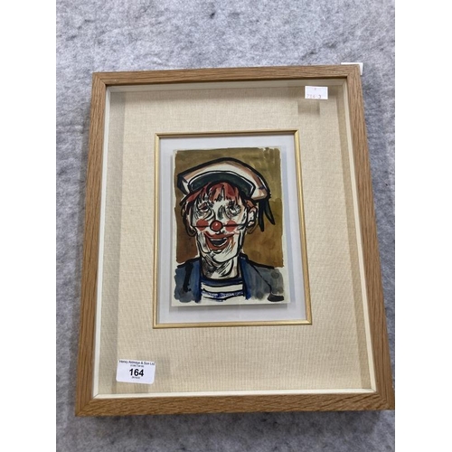 164 - Karl Lek (b1929): Wash/paper head of a clown, framed and glazed. 6¾ins. x 4¾ins.