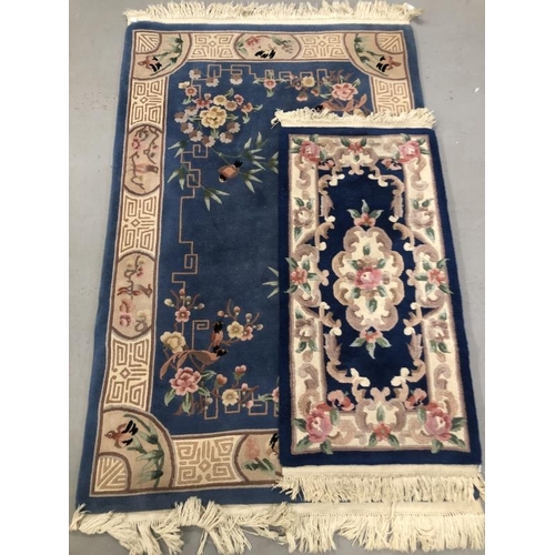 21 - Carpets & Rugs: Chinese hand washed, the first blue ground with avian and floral decoration in blues... 