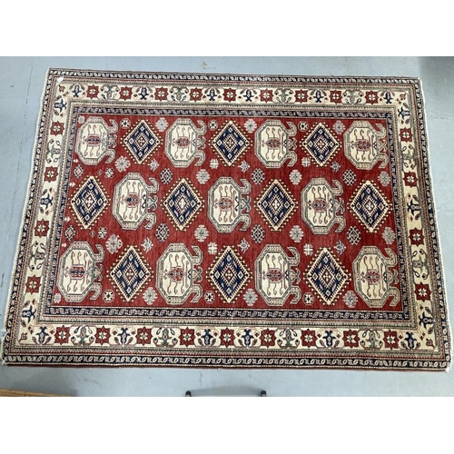 24 - Carpets & Rugs: 20th cent. Caucasian carpet most likely Kazak, red ground, twenty-one large guls plu... 