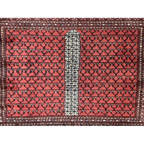 25 - Carpets & Rugs: Early 20th cent. Turkman rug, unusual two rectangular central panels in blues, black... 