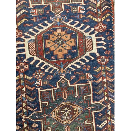 30 - Carpets & Rugs: 19th cent. Caucasian rugs possibly Gilum, the first blue ground with three central p... 