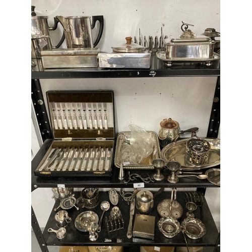 45 - Silver Plate: Collection of items including coffee pots, candle holders, set of mother of pearl hand... 