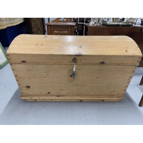 57 - 20th cent. Bow topped pine chest with candle box. 41ins. x 23ins. x 26ins.