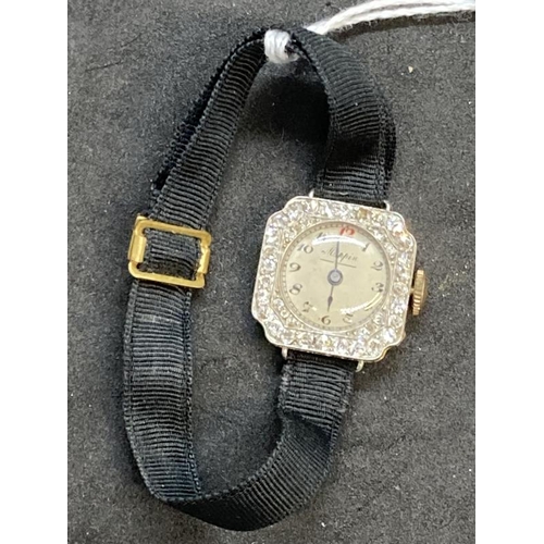 570 - Watches: 18ct gold and platinum ladies diamond set by Mappin attached to a Moira band. Estimated tot... 