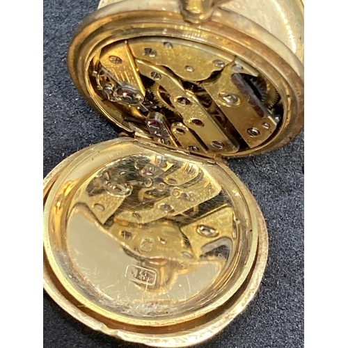 571 - Watches: Half hunter 18ct gold with a Roman numeral ring and the Royal Crown on inside over set in a... 