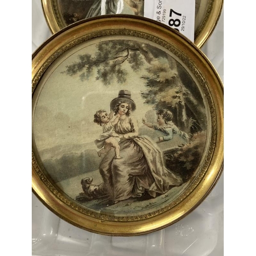 587 - 19th cent. English School: Pair of miniatures lady and children painted on silk in round brass frame... 