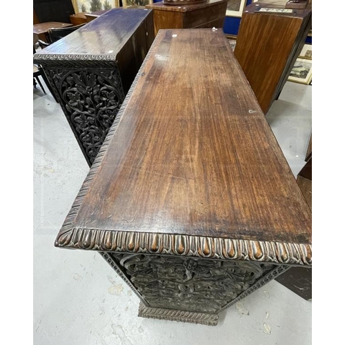 103 - 19th cent. Anglo Indian teak cabinets c1860 with carved and pierced cupboard doors and sides enclosi... 