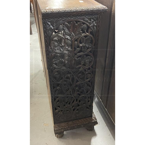 103 - 19th cent. Anglo Indian teak cabinets c1860 with carved and pierced cupboard doors and sides enclosi... 