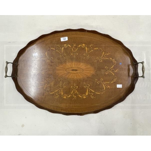 104 - Edwardian oval inlaid tray with wavy edge gallery, brass handles, central inlaid shell surrounded by... 