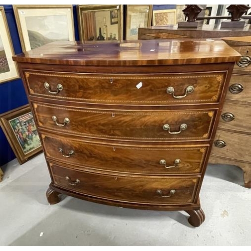 105 - 19th cent. Mahogany bow front chest of four long drawers with swan neck brass handles, herring bone ... 