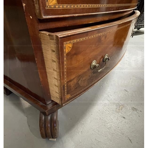 105 - 19th cent. Mahogany bow front chest of four long drawers with swan neck brass handles, herring bone ... 