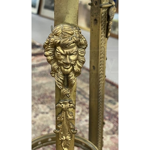 114 - 19th cent. Empire style gilt brass jardiniere stand cast leaves and scrolls and three mask heads, ci... 