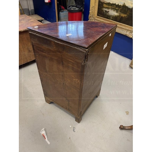 115 - Early 19th cent. Mahogany corner bow front washstand with lift up lid, two cupboard doors, brass kno... 