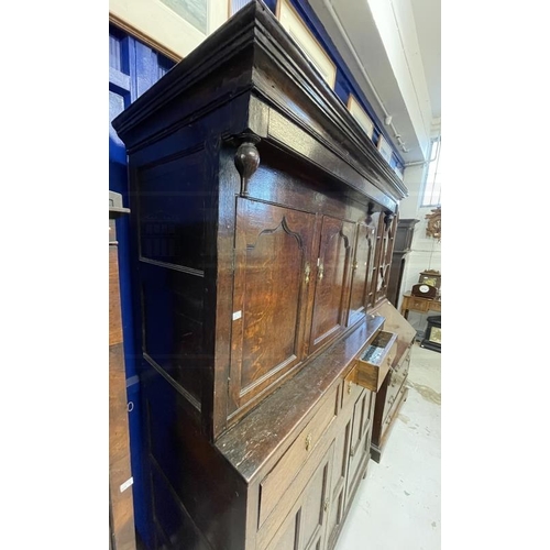 132 - 18th cent. Oak court cupboard the top has three panelled cupboard doors, the lower section with thre... 