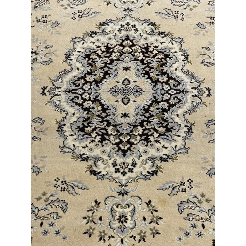 137 - Carpets & Rugs: 20th cent. English carpet, ivory ground with floral decoration in blues, browns, whi... 