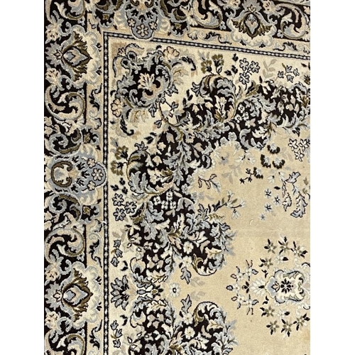 137 - Carpets & Rugs: 20th cent. English carpet, ivory ground with floral decoration in blues, browns, whi... 