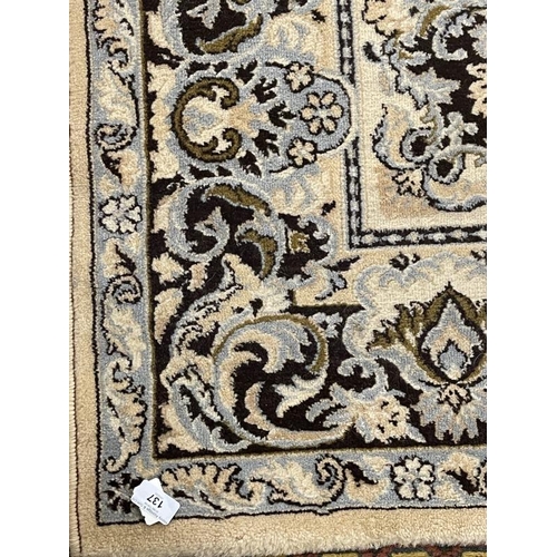 137 - Carpets & Rugs: 20th cent. English carpet, ivory ground with floral decoration in blues, browns, whi... 