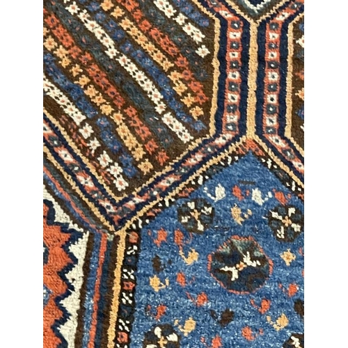 138 - Carpets & Rugs: Late 19th cent. Caucasian Kazak carpet, red ground with central medallion decorated ... 