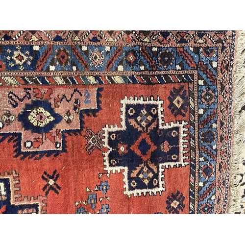 140 - Carpets & Rugs: 19th cent. Persian carpet, red ground, five medallions with geometric designs, four ... 