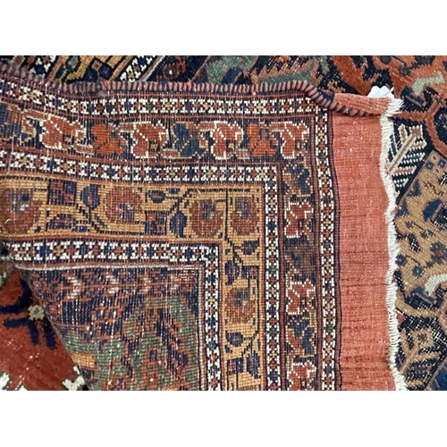 141 - Carpets & Rugs: 19th cent. Kazak rug, multicoloured ground decorated with geometric patterns in ivor... 