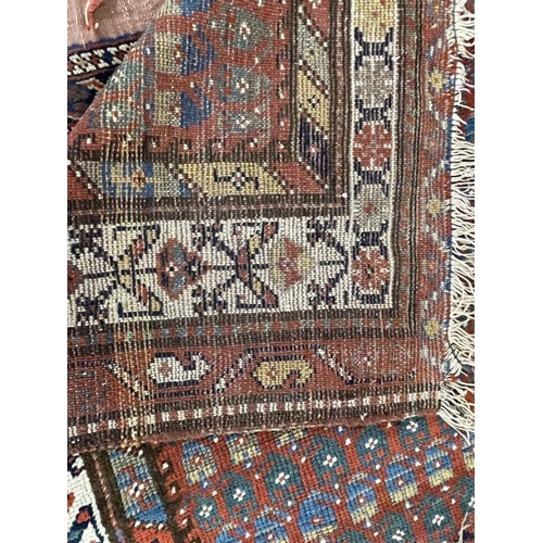 142 - Carpets & Rugs: 19th cent. Persian runner, red ground with stylised floral decoration, four borders ... 