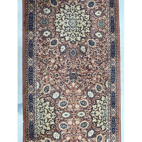 143A - Carpets & Rugs: 20th cent. Keshan runner, red ground with stylised floral decoration and one border ... 